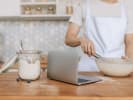 Online Couples Cooking Class - The Traditions of Tiramisu: whisking in a bowl next to laptop