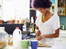Online Cooking Class - Pajama Brunch With Mimosas and Pancakes: woman cooking pancakes in pajamas