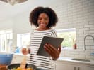 Online Cooking Class - Fish Tacos and Bananas FlambÃ©: woman taking an online cooking class