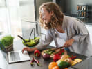 Online Cooking Class - Going Vegan Three-Week Series: woman taking an online cooking class at home