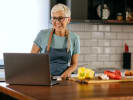 Online Cooking Class - Empanadas and Homemade Ice Cream: woman taking an online cooking class at home