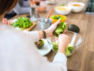 Team Building Cooking Class - The Ultimate Guacamole-Making Contest: woman using avocado to make guacamole