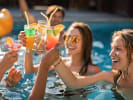 Private Chef - Classic Burgers & Hot Dogs Poolside BBQ: women partying in the pool