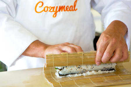 Mechanical sushi sous chef makes rolls fast