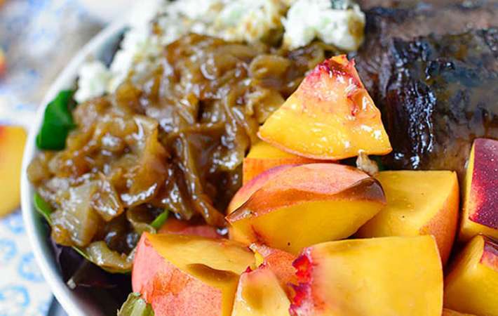 balsamic steak and peach salad is a refreshing combination for a steak dinner idea