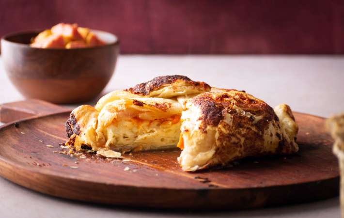 flaky, sweet and savory baked brie with jam is an easy super bowl appetizer