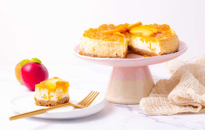 peach cobbler cheesecake combines two incredible summer desserts in one bite