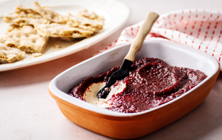 this spicy, sweet and tart cranberry jalapeno dip is a delicious dip for the super bowl