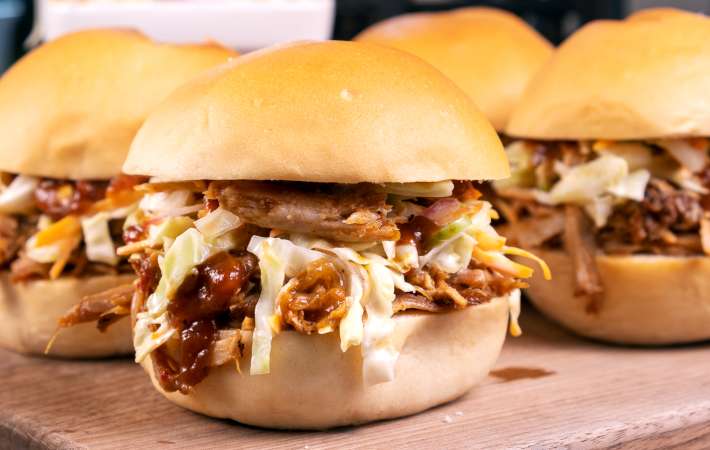 pulled pork sliders are an easy super bowl appetizer to feed a crowd