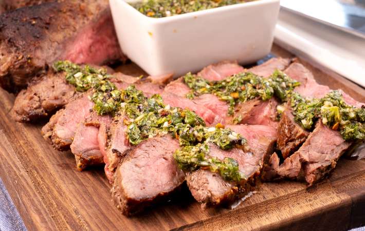 skirt steak with chimichurri is a juicy and herbaceous quick steak dinner idea
