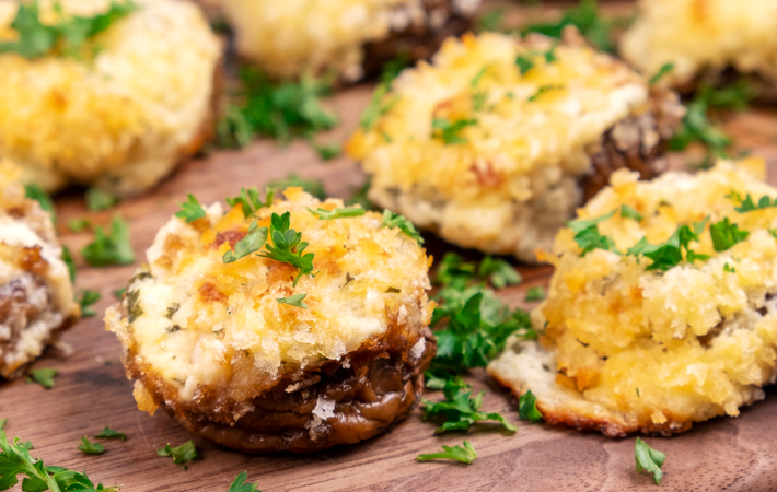 cream cheese stuffed mushrooms are a deliciously cheesy easy super bowl appetizer