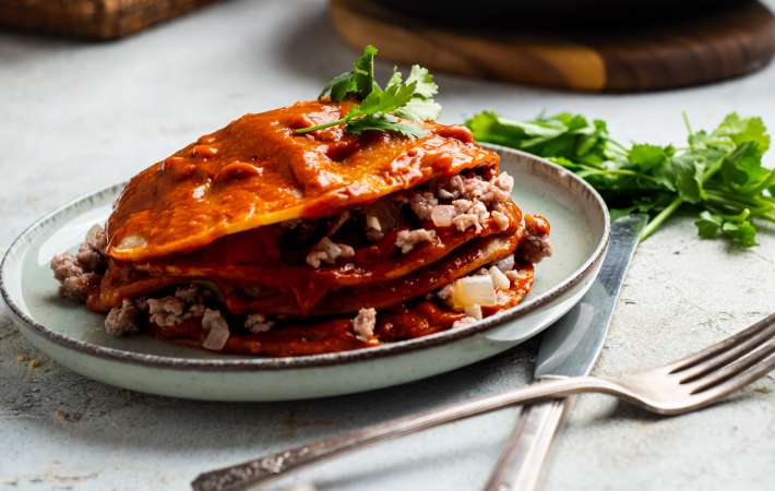enchiladas rojas is a deliciously layered mexican dinner