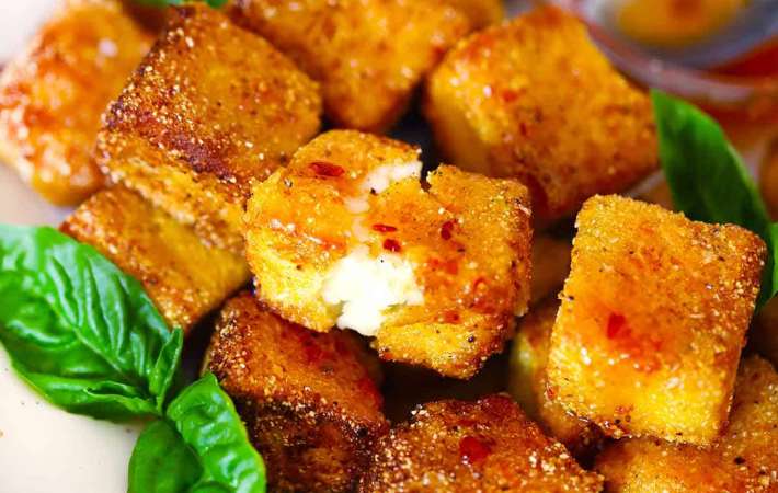 fried halloumi bites with spicy honey is a punch of both sweet and savory