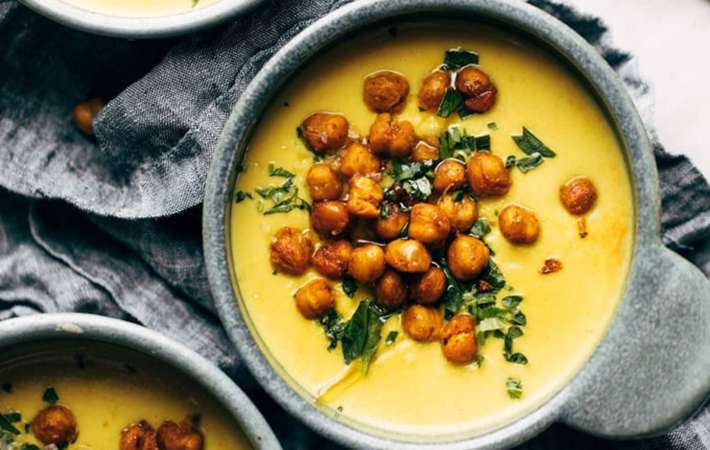 golden soup is filled with healthy ingredients