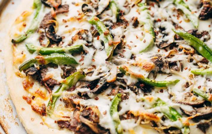 philly cheese steak pizza is a mouthwatering, hearty steak dinner