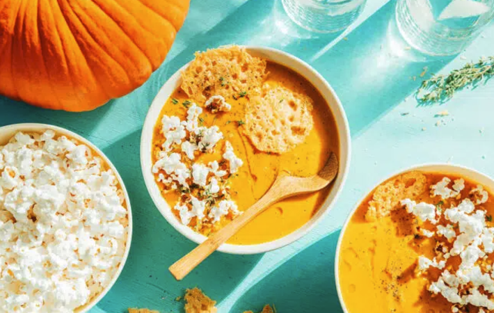 pumpkin soup with parmesan popcorn crunch is an elevated pumpkin vegetable soup recipe
