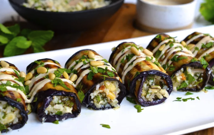 herby couscous stuffed eggplant rolls are a hearty and healthy vegetarian appetizer