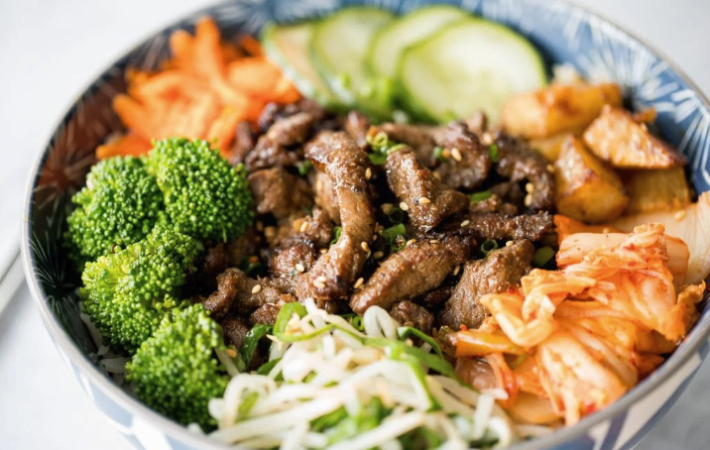 korean beef steak rice bowl is bursting with inviting textures and flavors