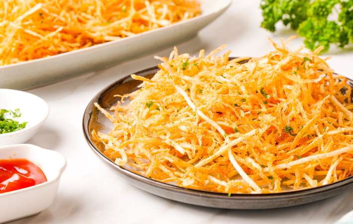shoestring fries are a crispy, versatile easy super bowl appetizer