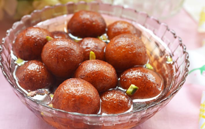 rose scented gulab jamun is one of the most popular asian desserts