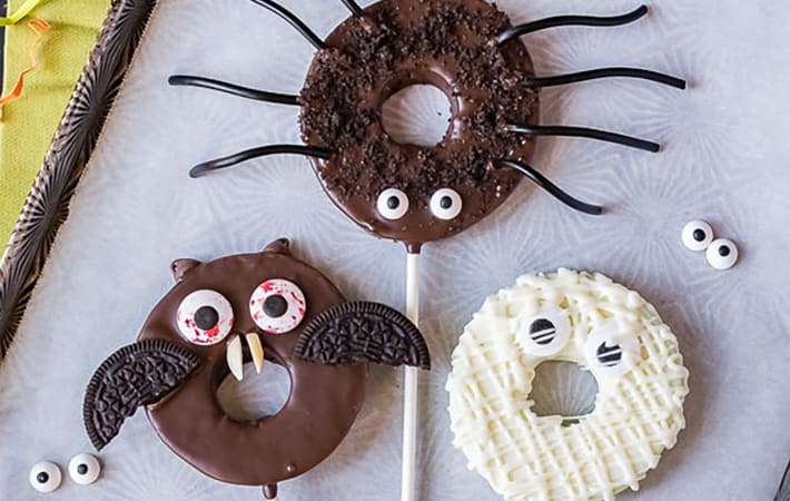 chocolate dipped halloween apple rings are a festive healthy halloween dessert