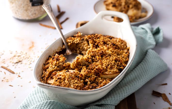 baked apple oatmeal is a tender crowd-pleasing vegetarian breakfast oatmeal