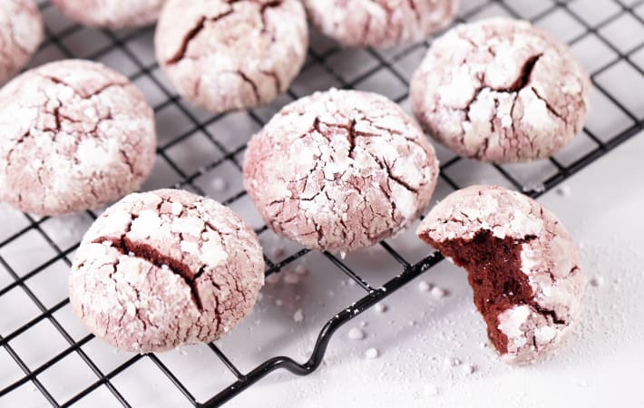 red velvet crinkle cookies uncover their spooky secret to reveal a blood red inside