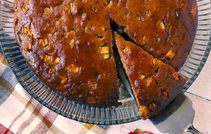 spiced apple cake with honey cider glaze is enriched with olive oil and greek yogurt