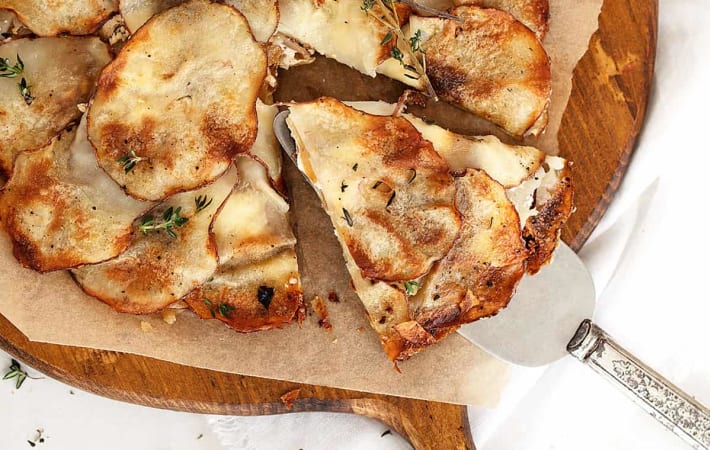 potato galette with caramelized onions and goat cheese have crisp edges and a tender center