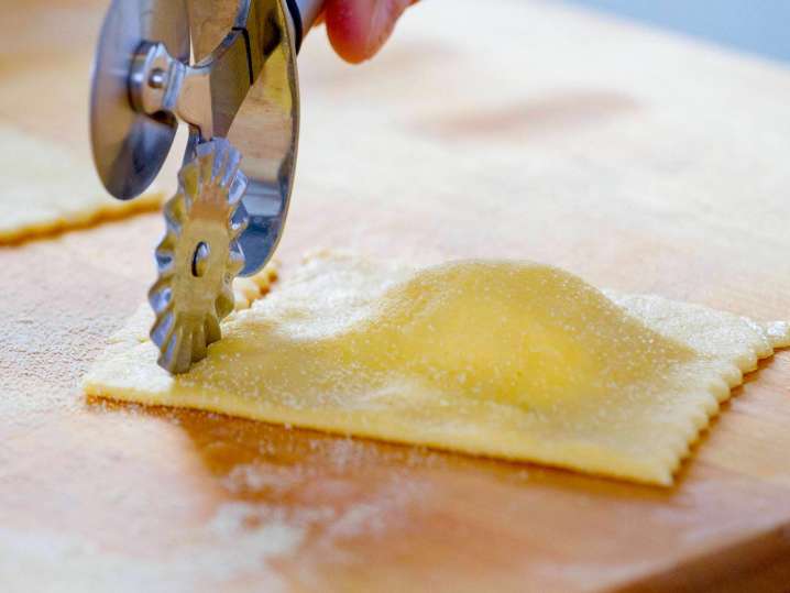 cutting butternut squash ravioli Shot