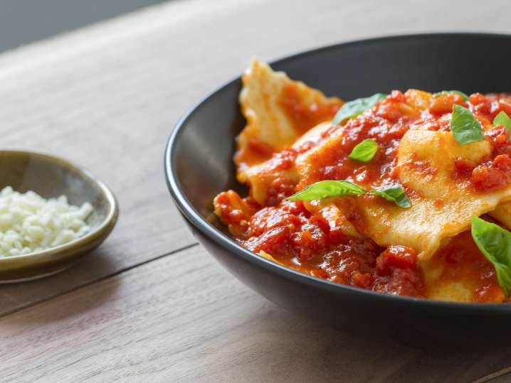 homemade ravioli with tomato alfredo sauce Shot