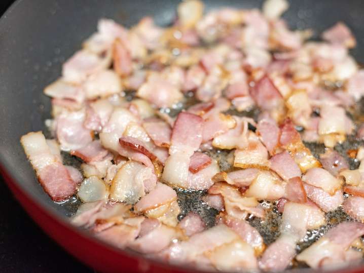 guanciale rendering in a frying pan Shot