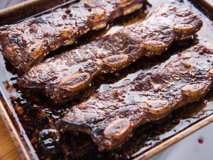 beef short ribs on a baking tray Shot