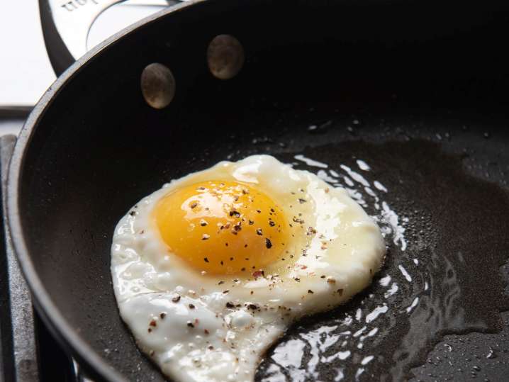 egg frying in a pan Shot