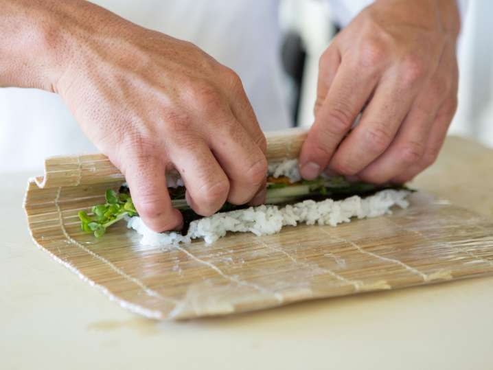 Fort Lauderdale - chef rolling vegetable sushi Shot