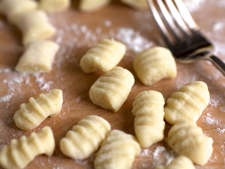 homemade gnocchi on a cutting board Shot