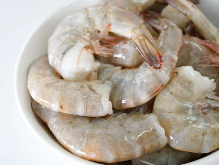 fresh raw shrimp in a bowl Shot