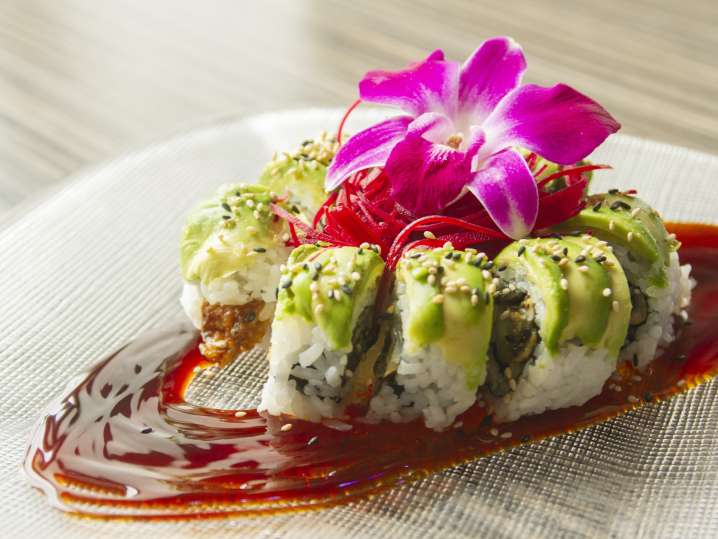 plated vegetable caterpillar roll on a plate Shot