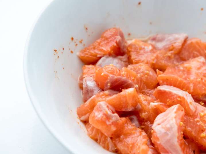 salmon in a white bowl Shot