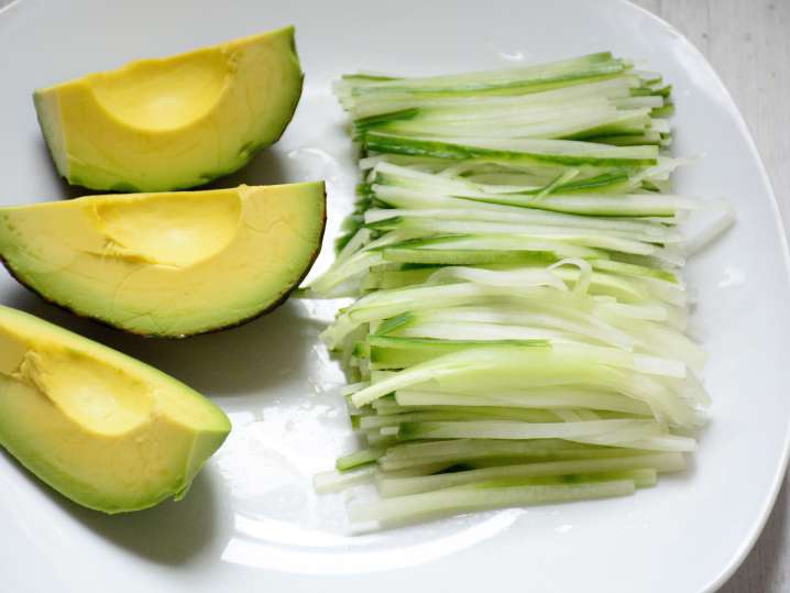 avocado and cucumber slices on a plate Shot