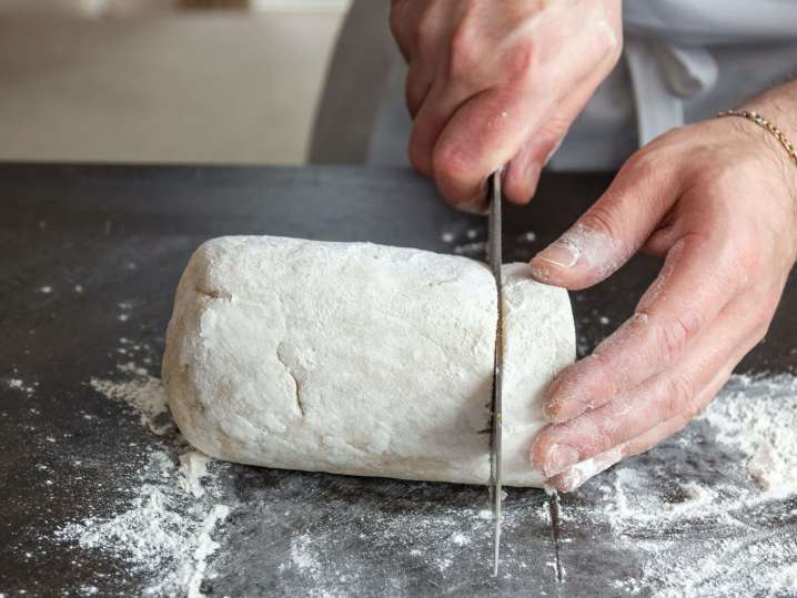 chef slicing gnocchi dough | Classpop Shot