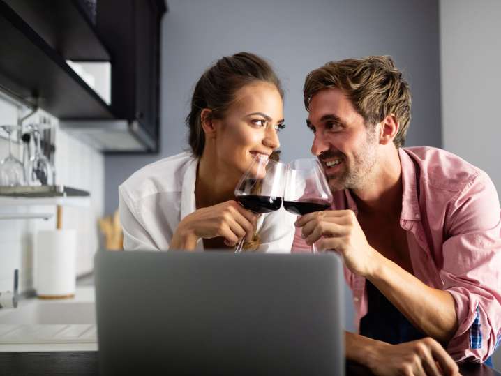 people drinking wine and taking an online cooking class | Classpop Shot