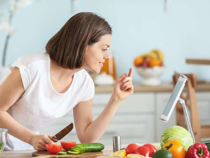 person taking an online cooking class at home | Classpop Shot