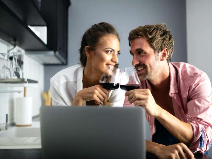 couple drinking wine during an online cooking class | Classpop Shot