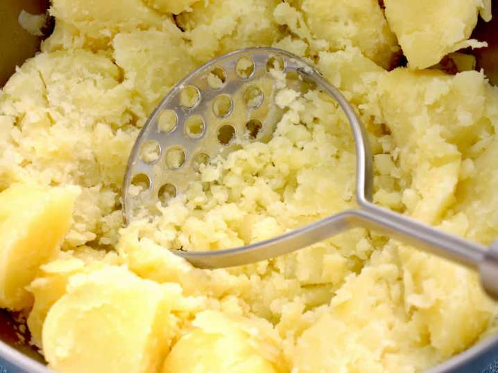 mashing potatoes for Pommes Puree | Classpop
