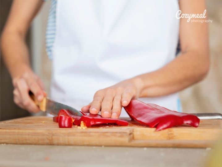 cutting red peppers