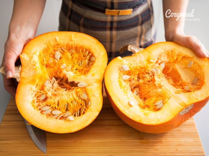 cutting pumpkin in half