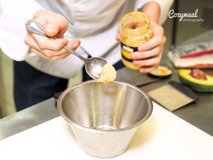 Adding Dijon mustard
