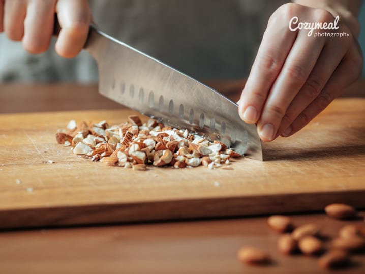 Chef cutting almonds