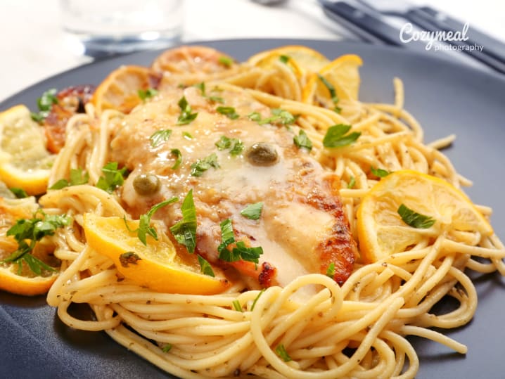 Chicken Piccata With White Wine Caper Beurre Blanc Over Angel Hair Pasta